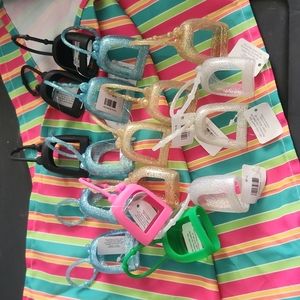 Hand sanitizer holders